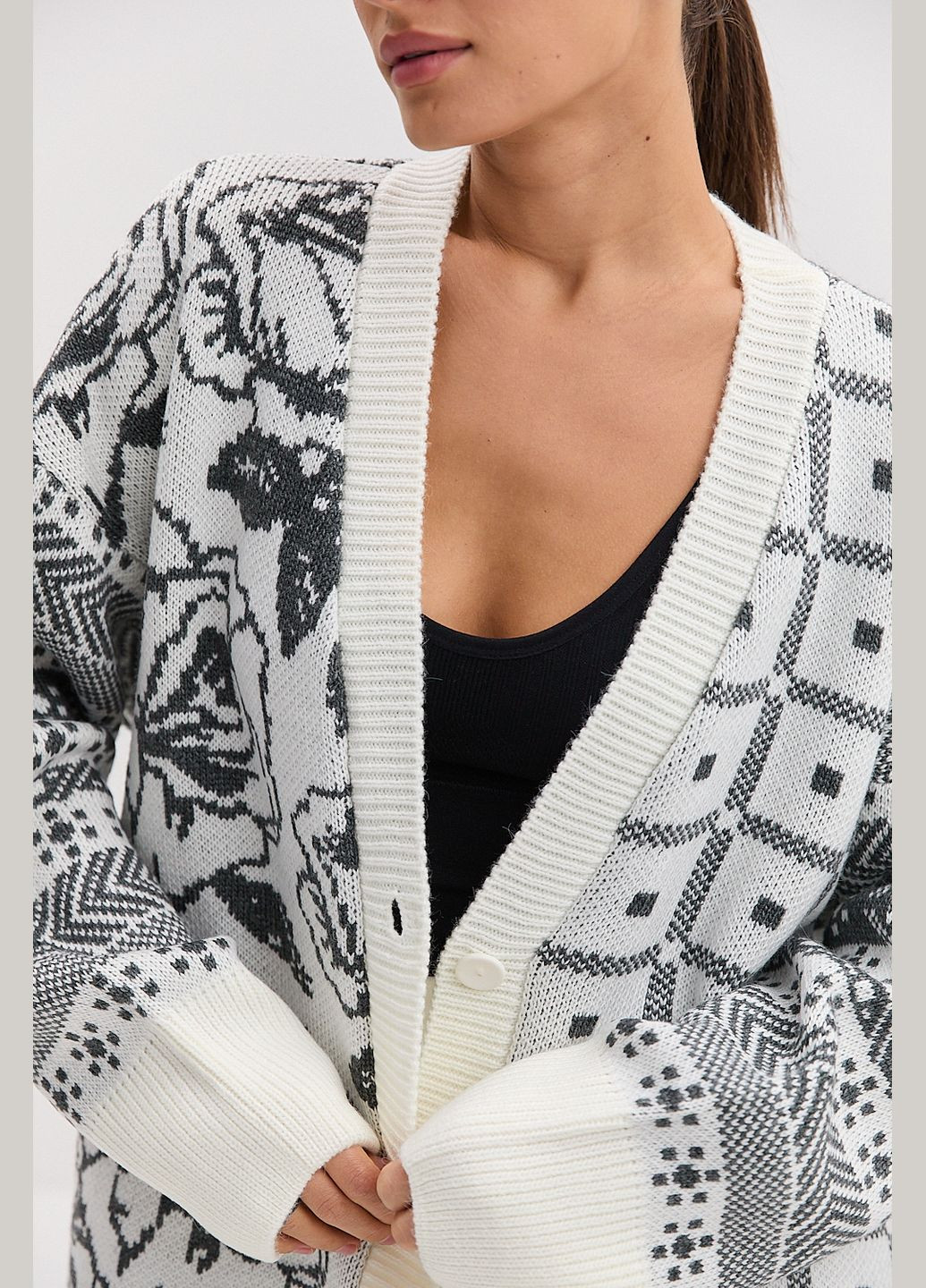 Жіночий в'язаний оверсайз кардиган з квітковими і геометричними візерунками Arjen (316301674)