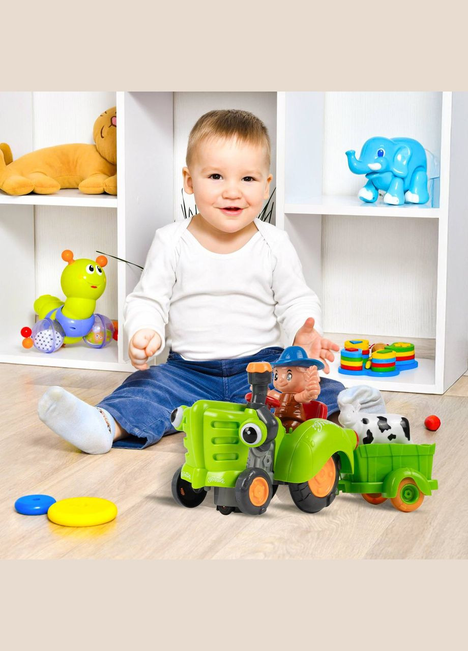 Детский музыкальный зеленый трактор HD 963 со съемным прицепом, музыкальными и световыми эффектами TK Group (338851448)