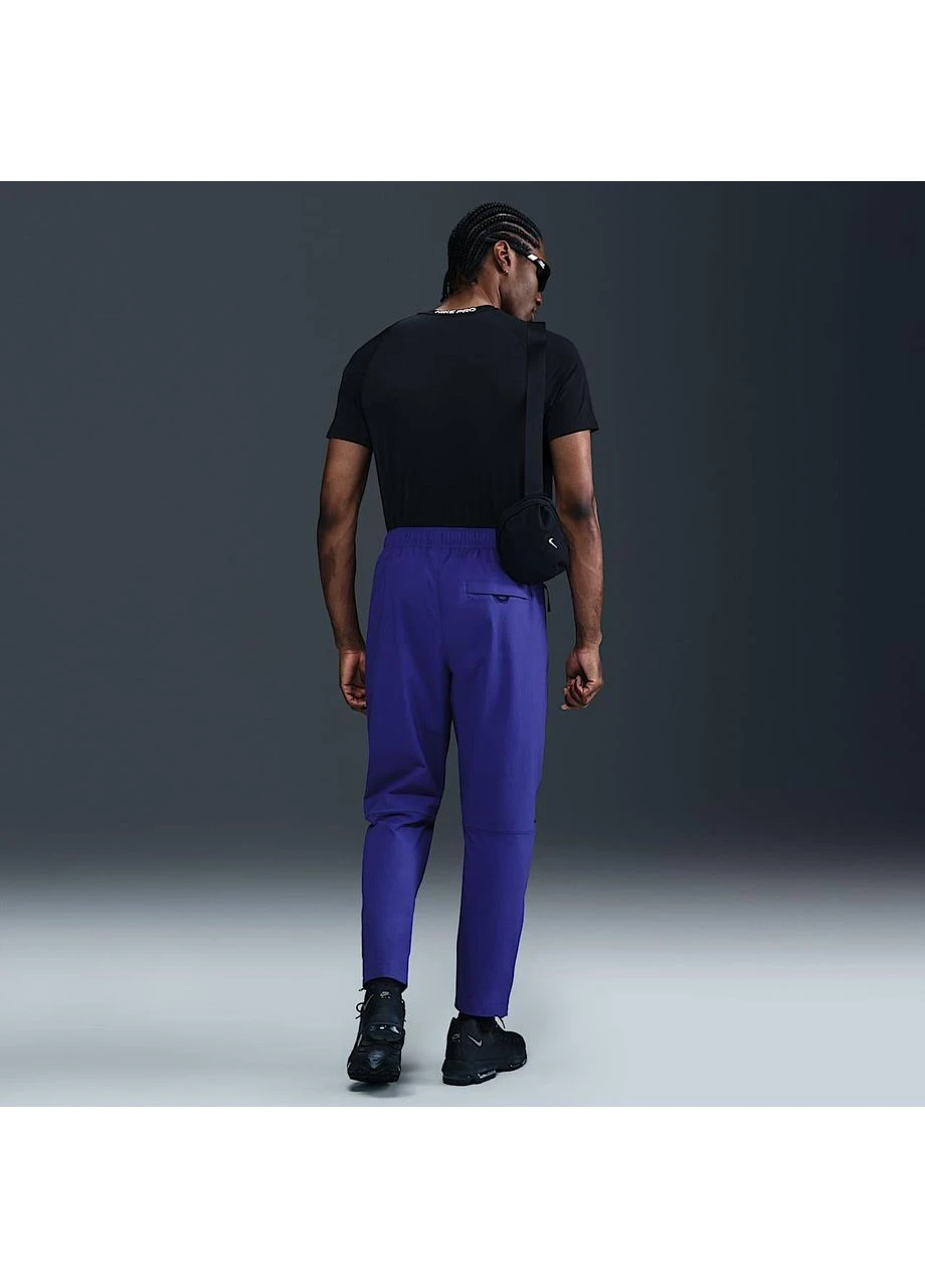 Фиолетовые демисезонные брюки Nike