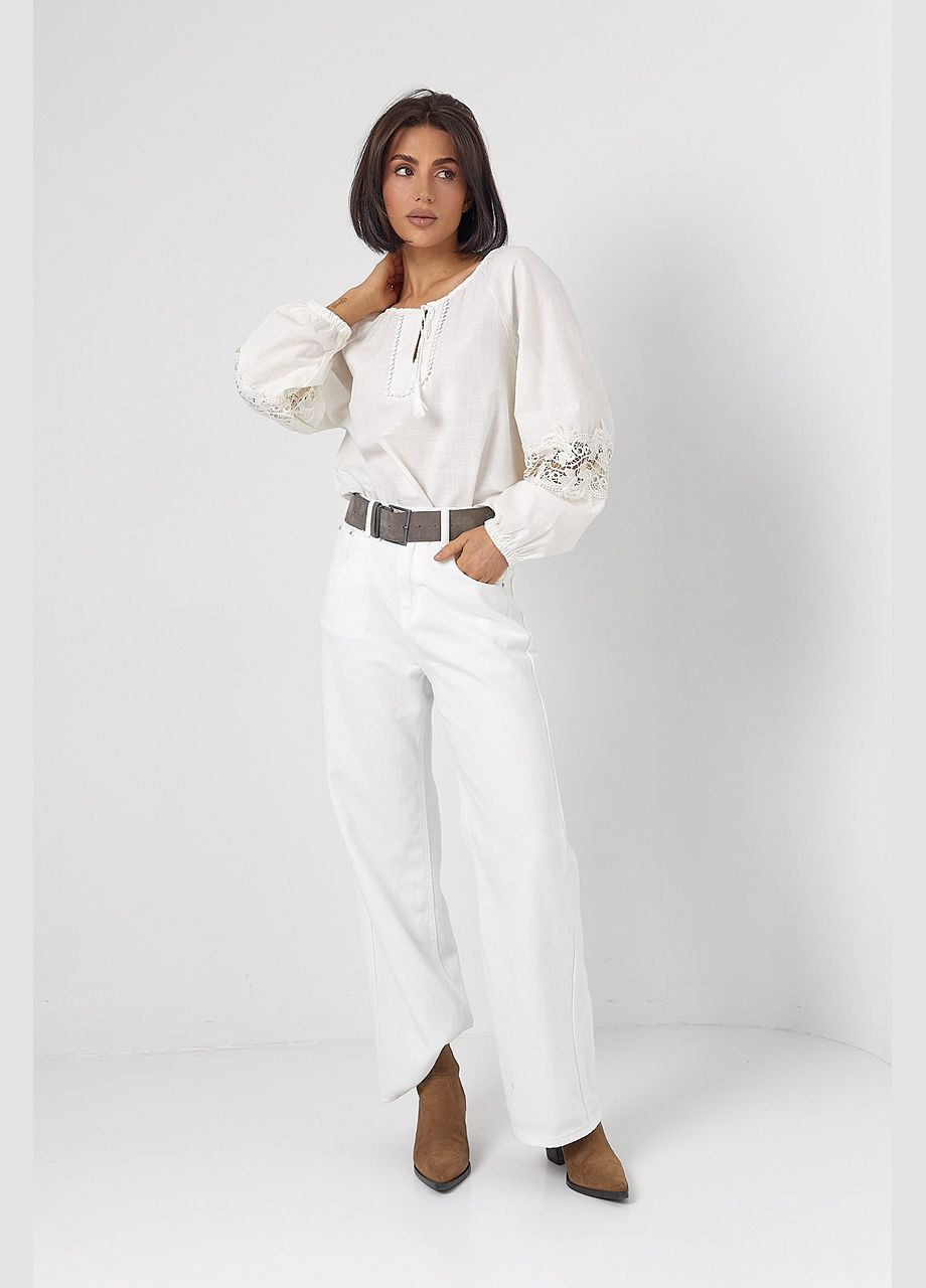 Біла жіноча блузка з мереживними вставками Delvinss