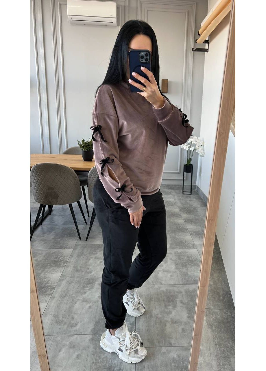 Стильний костюм для жінок з декоративними зав’язками на рукавах Україна (355803212)