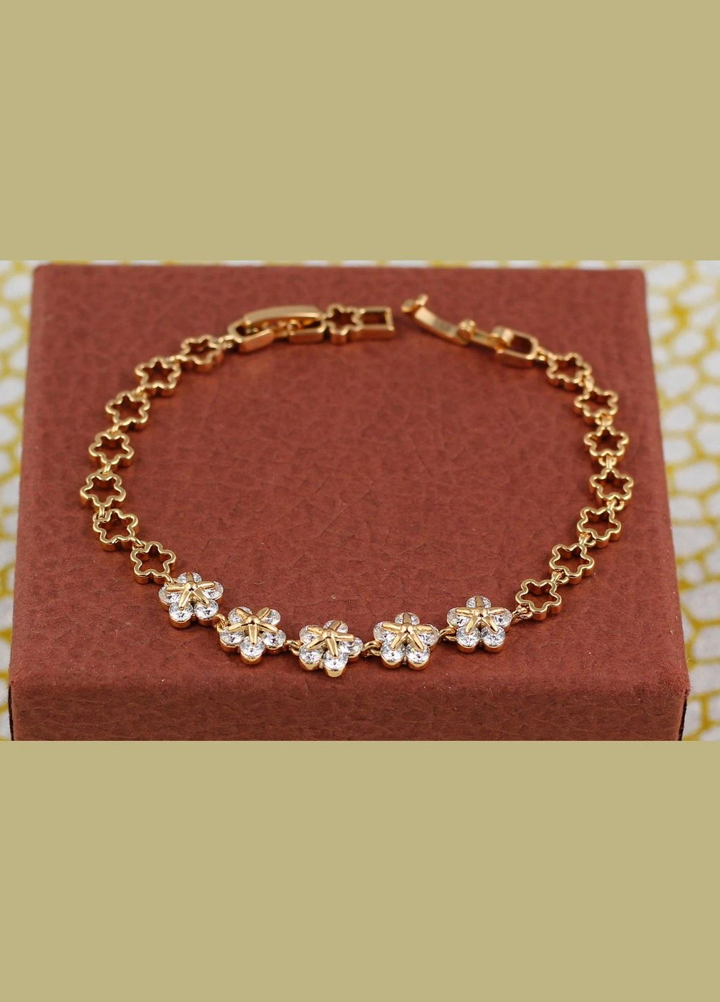Браслет квіткова галявина з білими каменями 19 см 9 мм золотистий Xuping Jewelry (316606470)