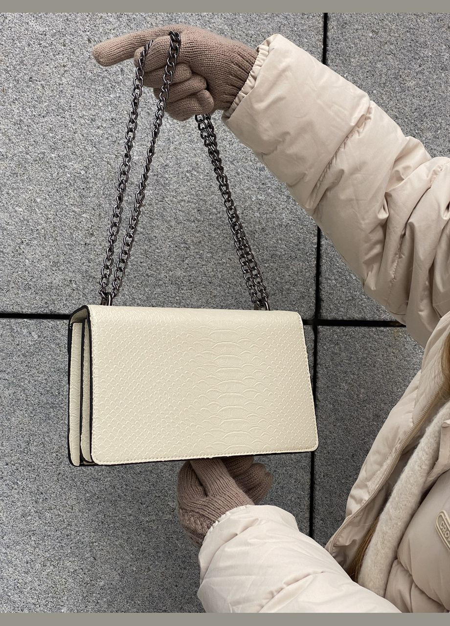 Жіноча сумка крос-боді з залізною підковою біла No Brand (289199490)