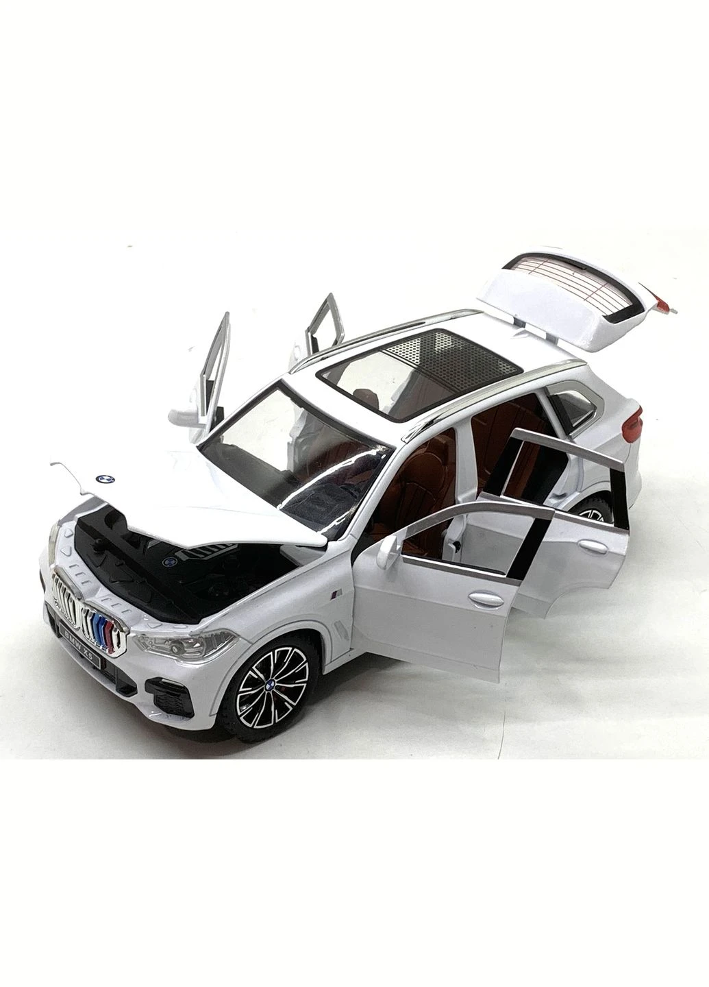 Машина BMW Х5 инерционная масштаб 1:24 открываются двери капот багажник 20см Белая (AP-2012) No Brand (302215673)
