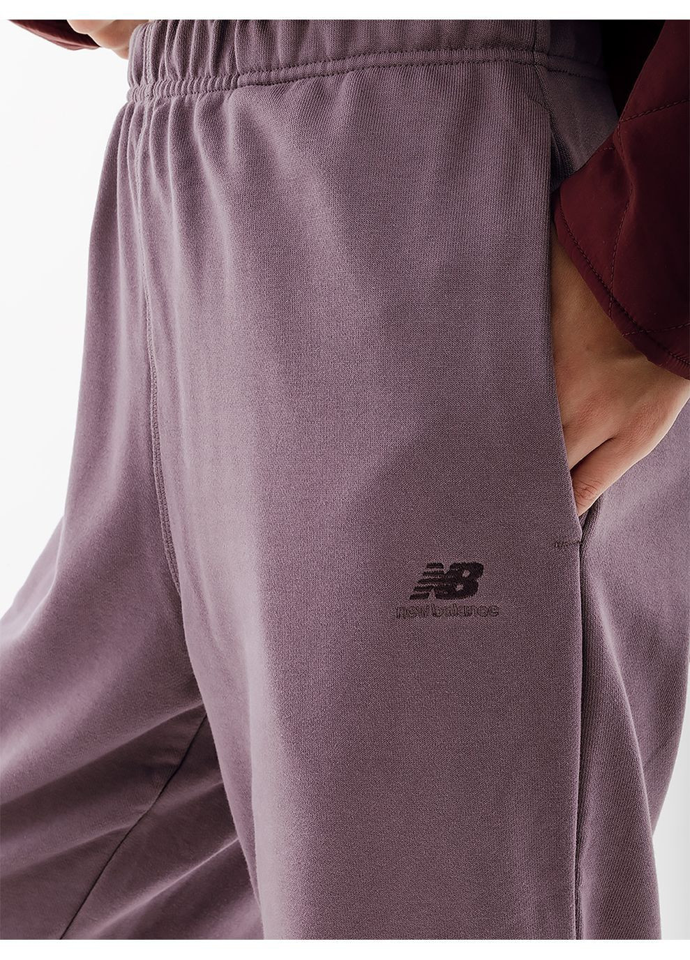 Фиолетовые спортивные демисезонные брюки New Balance
