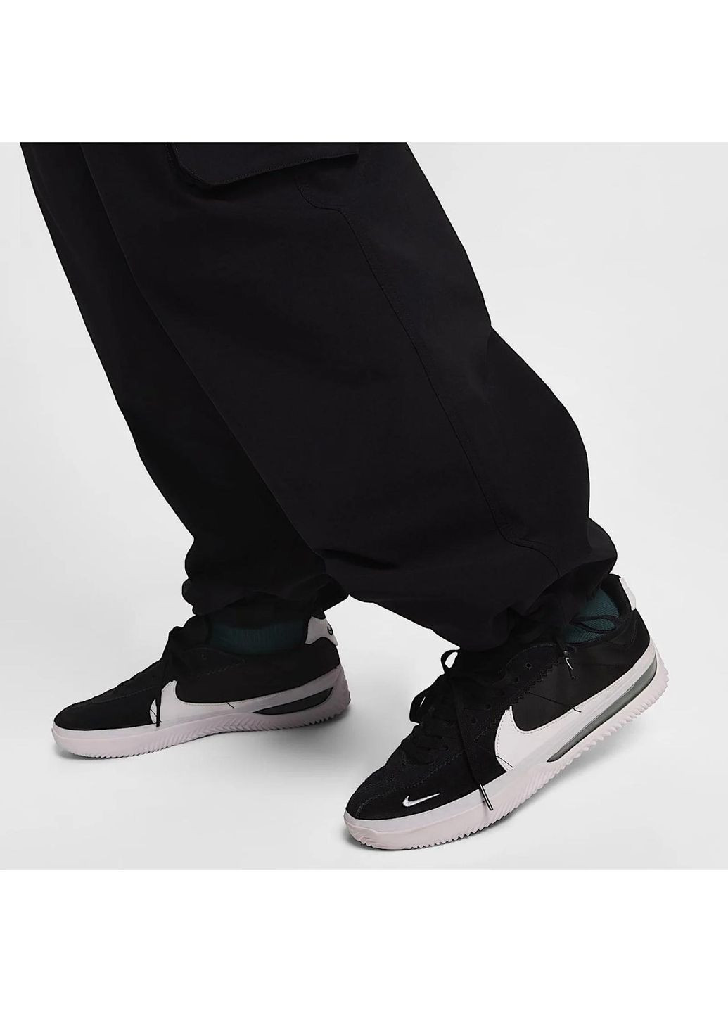 Черные демисезонные брюки Nike