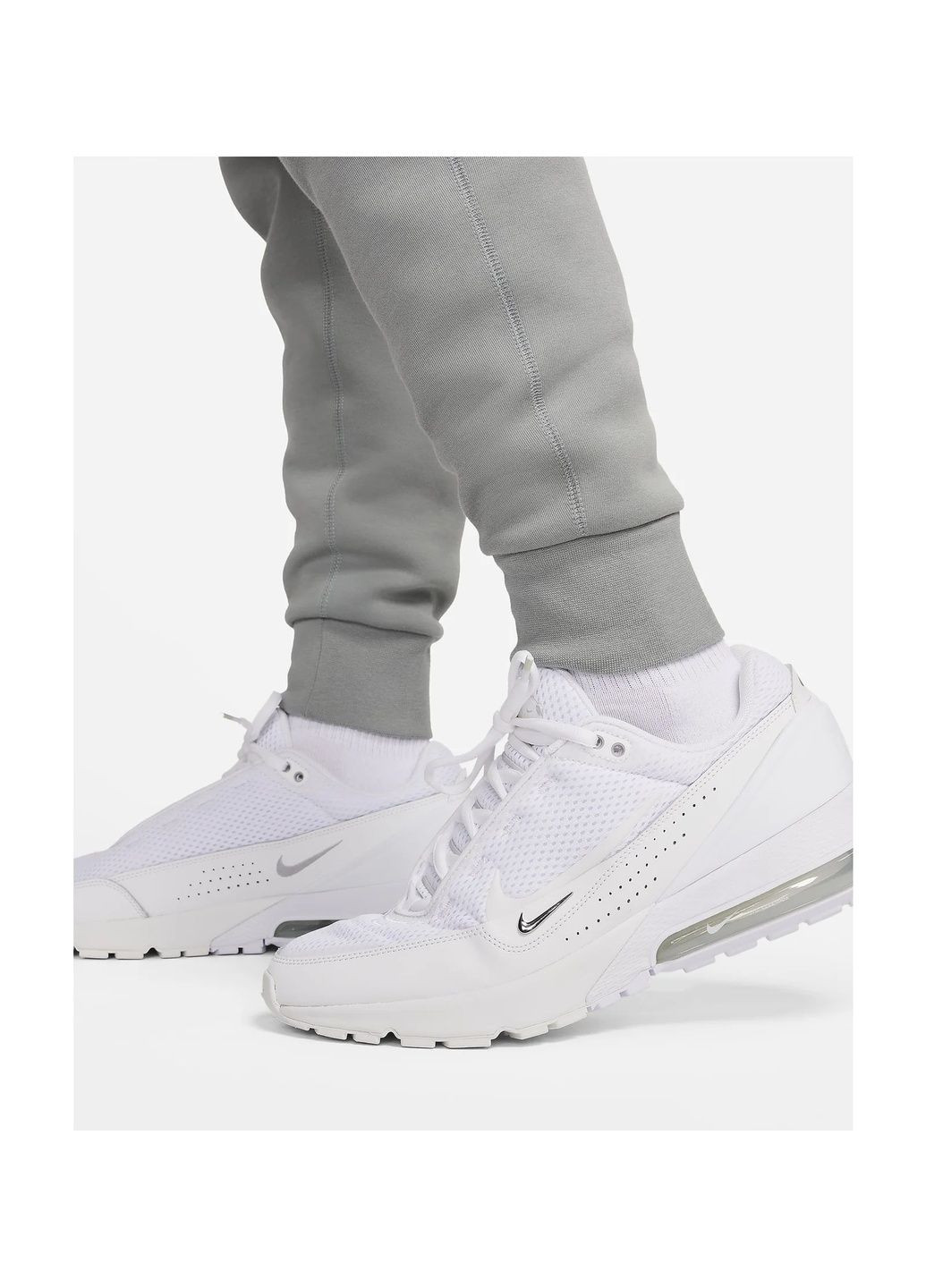 Серые демисезонные брюки Nike