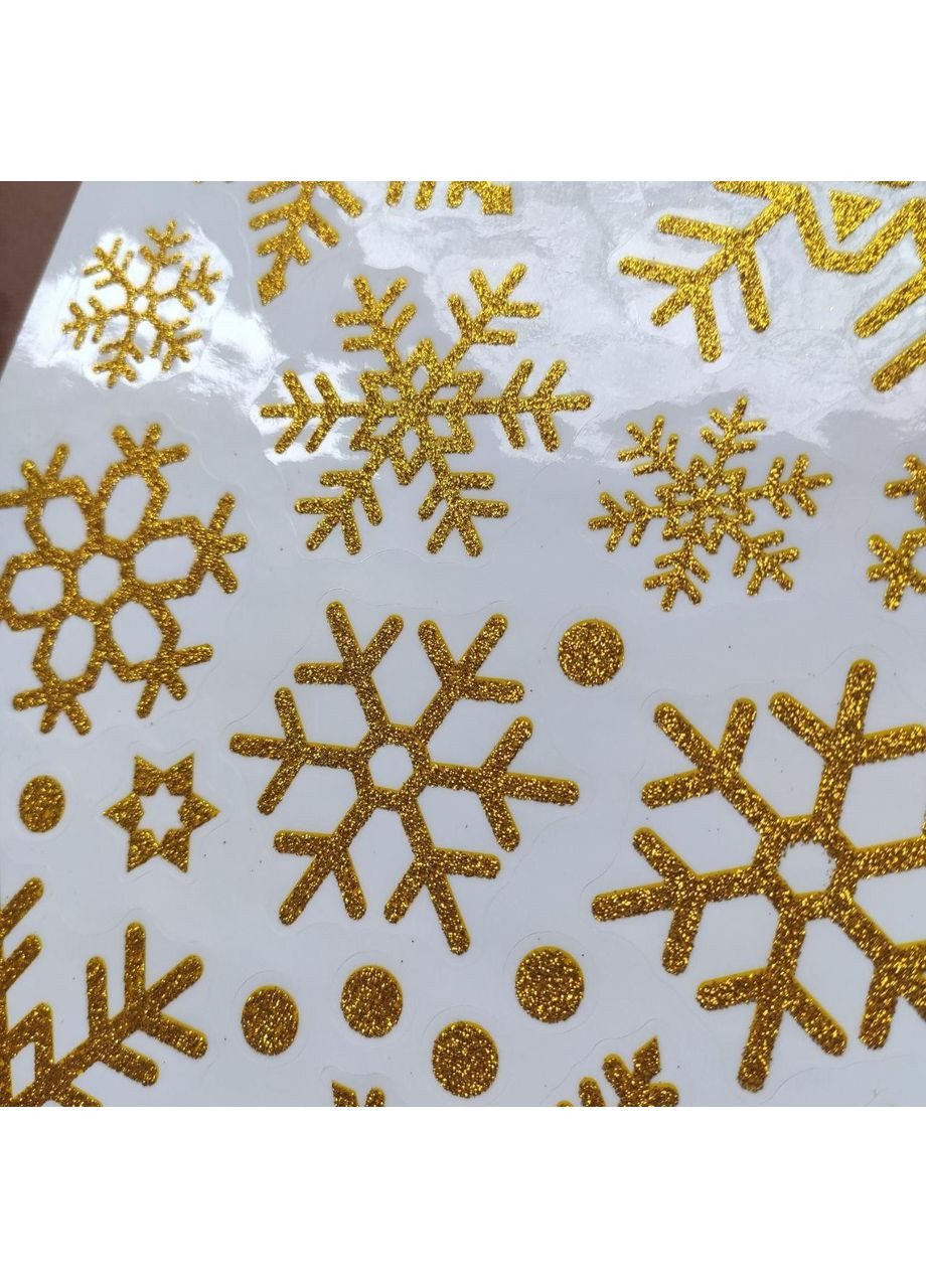Наклейки 29шт статичні з блискітками багаторазові "Сніжинки" золото No Brand (368703210)