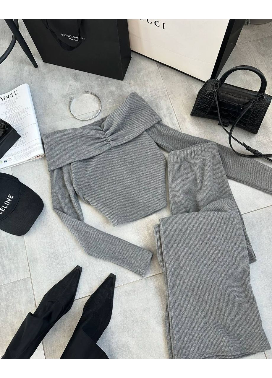 Жіночий костюм із топом та штанами палаццо Україна (361850161)