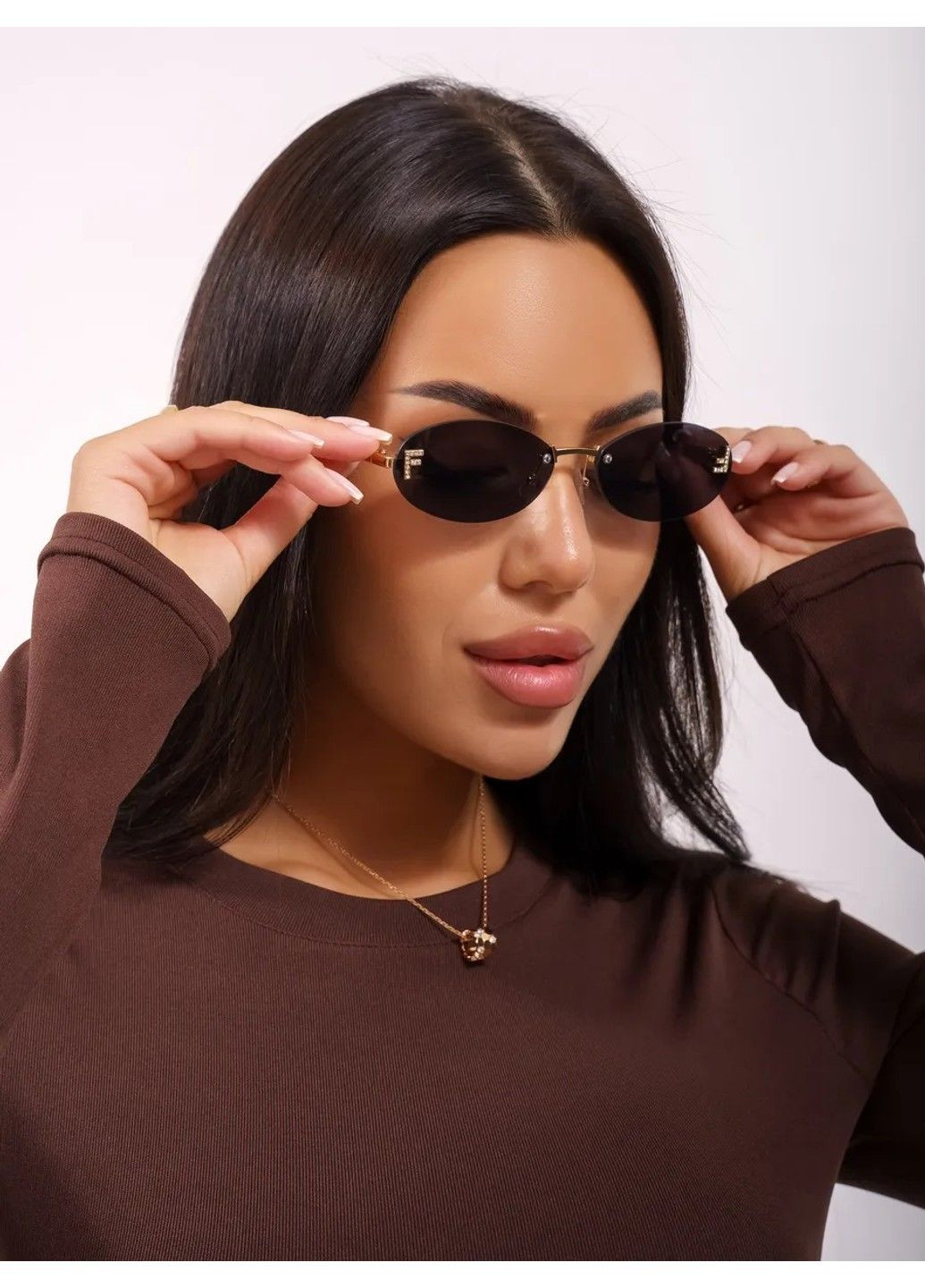 Окуляри сонцезахисні унісекс безобідкові Future золотисті з чорними лінзами No Brand (327095129)