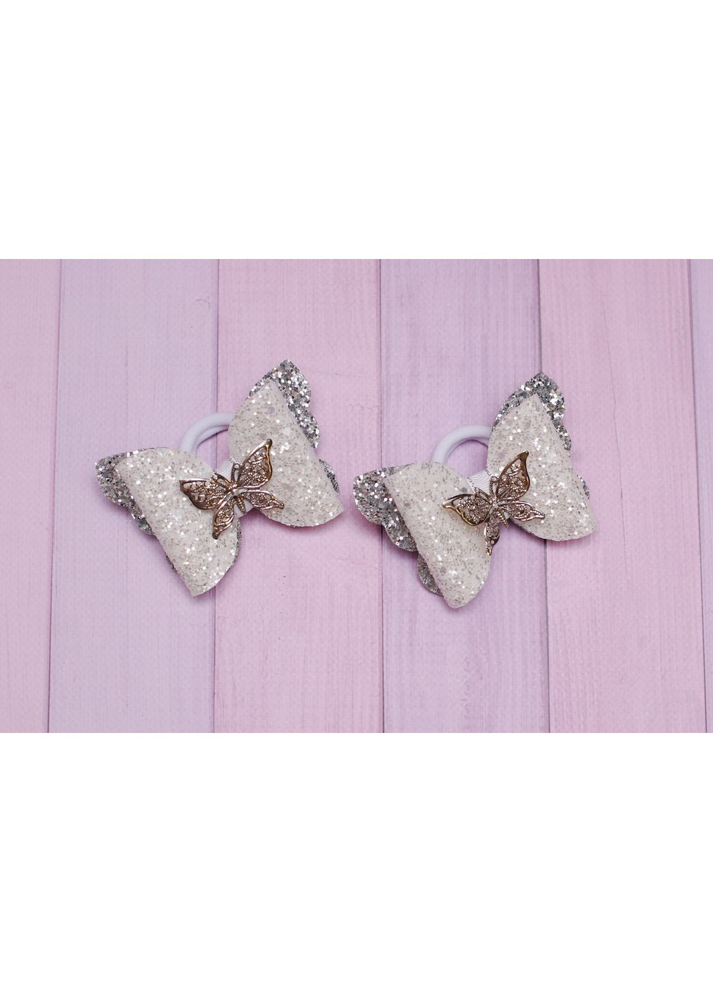 Банти на резинці для волосся дитячі з екошкіри біло-сріблясті 2 шт. 203 Okl (370386384)