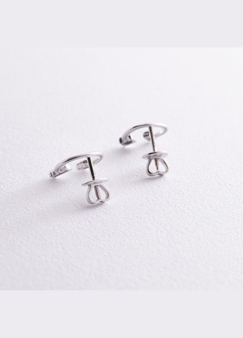 Сережки - пусети Дарсі у білому золоті с08317 Oniks (264023359)