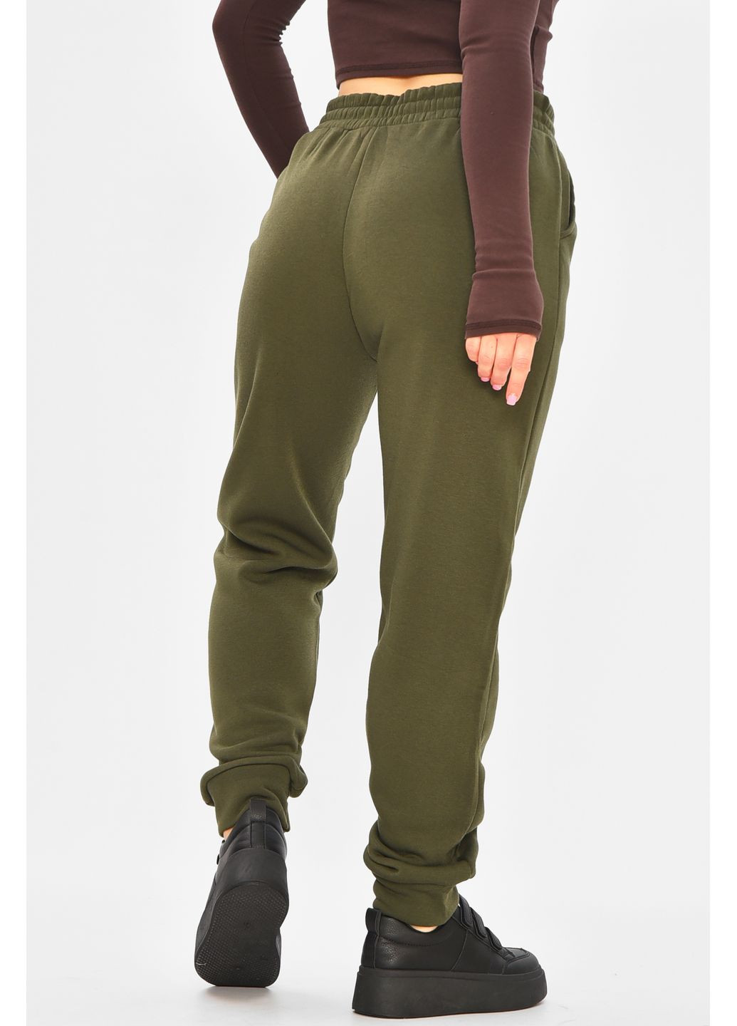 Спортивные штаны женские на флисе тёмно-зеленого цвета Let's Shop (364485139)