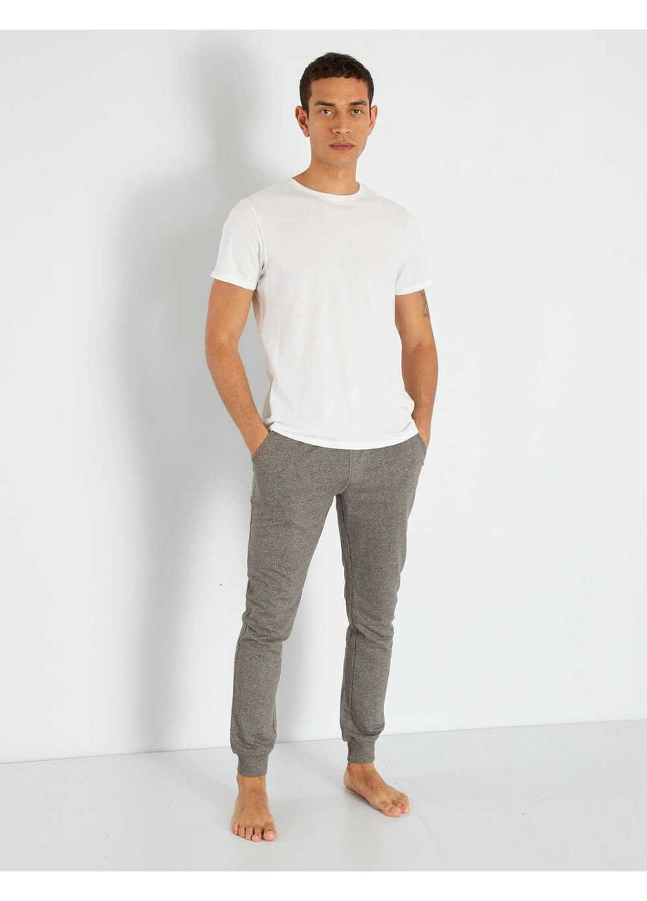 Серые брюки Kiabi