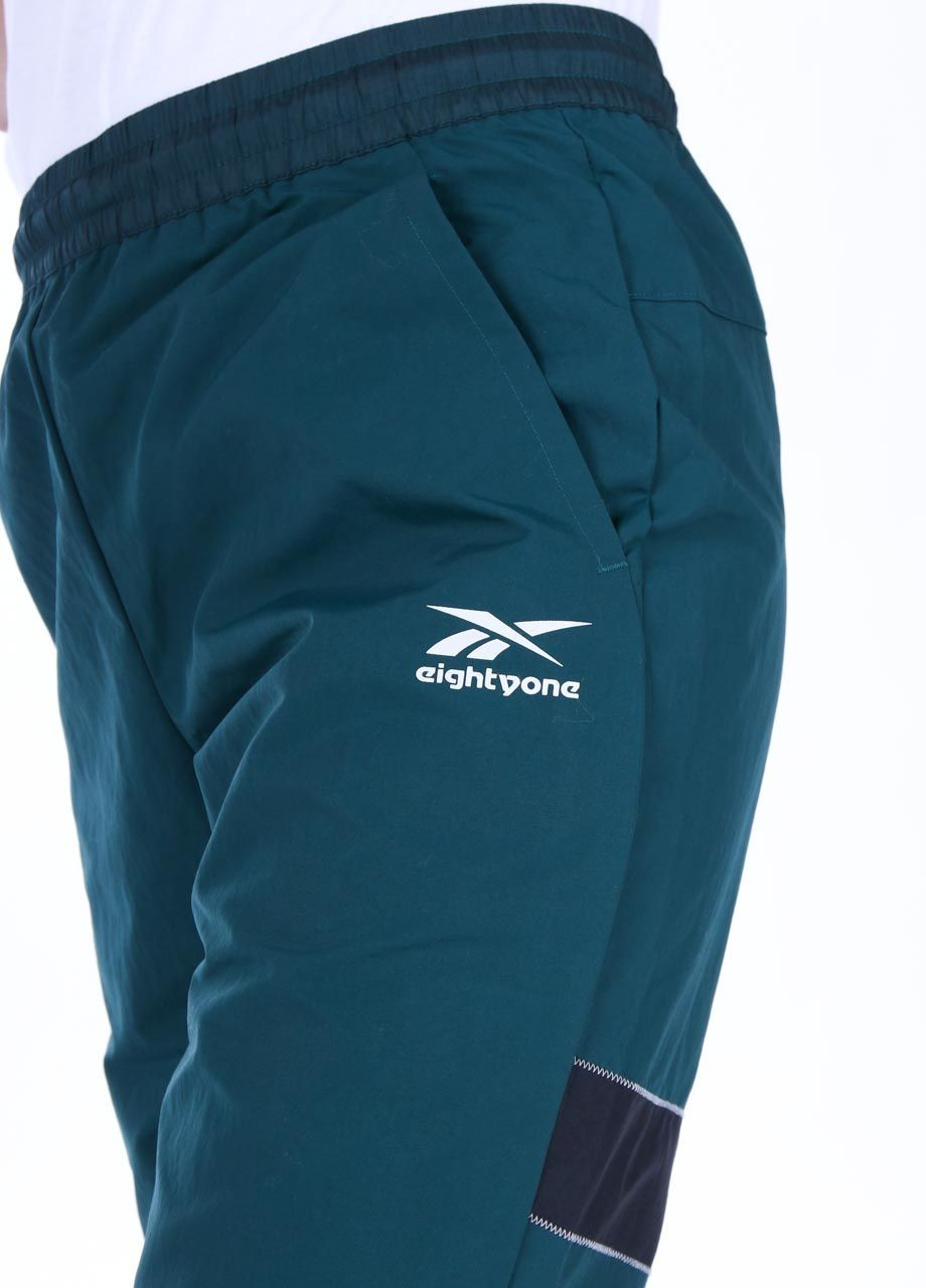 Одежда unisex штаны спорт 020425 В т.зеленая с черным H45571 США L(р) Reebok (372134941)