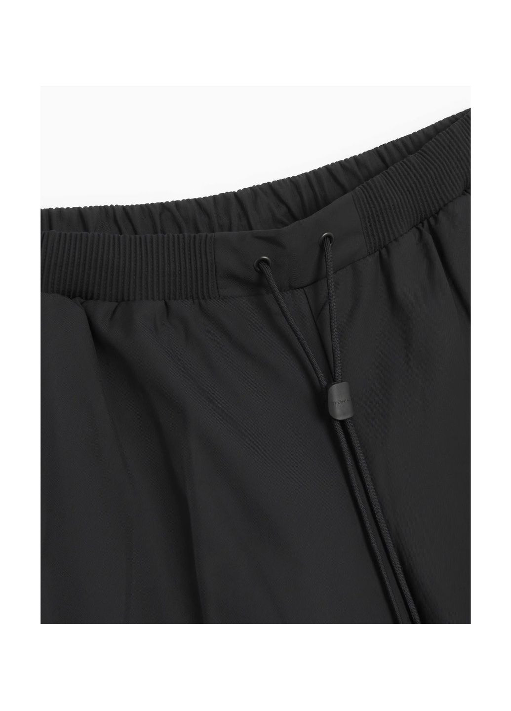 Черные демисезонные брюки Nike