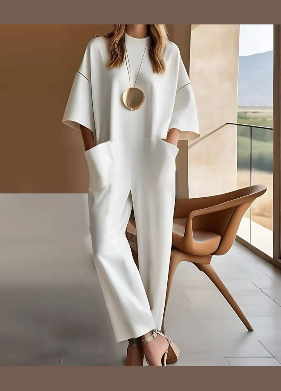 Жіночий комбінезон вільного крою Adelante комбінезон-брюки однотонний білий кежуал костюмна