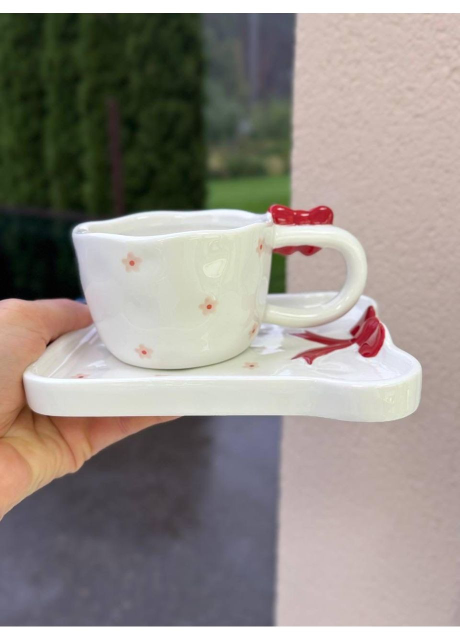 Елегантна керамічна чашка з блюдцем 220 мл «Червоні банти» — стиль для святкового настрою OSM (365549083)