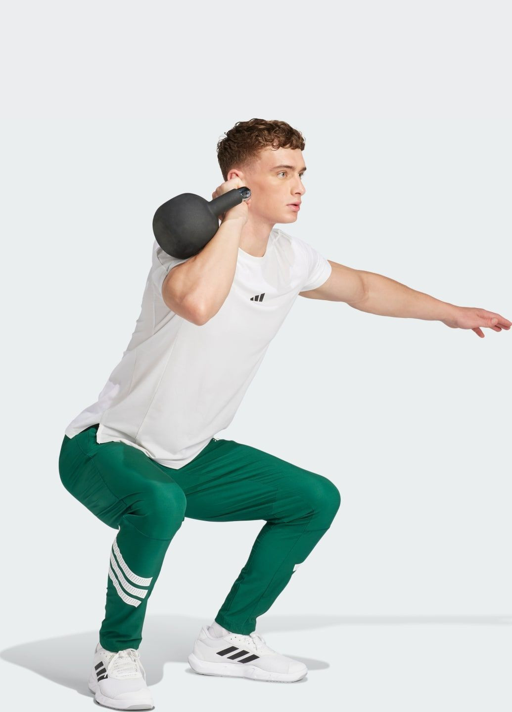 Зеленые спортивные демисезонные брюки adidas