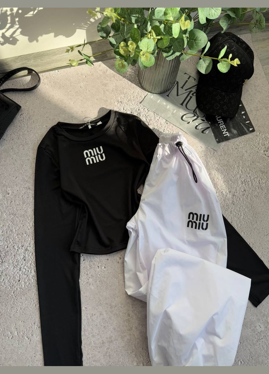 Костюм женский с лонгсливом и брюками. Adelante (321999821)