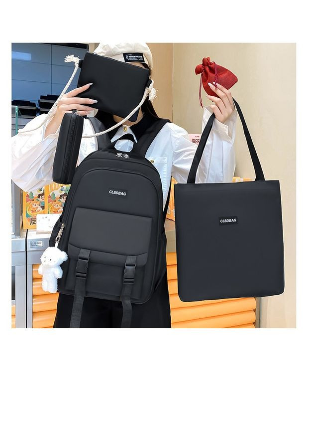 Рюкзак з накладною кишенькою чорний з сумочками та пеналом в комплекті з брелком ведмедика КиП (277698337)