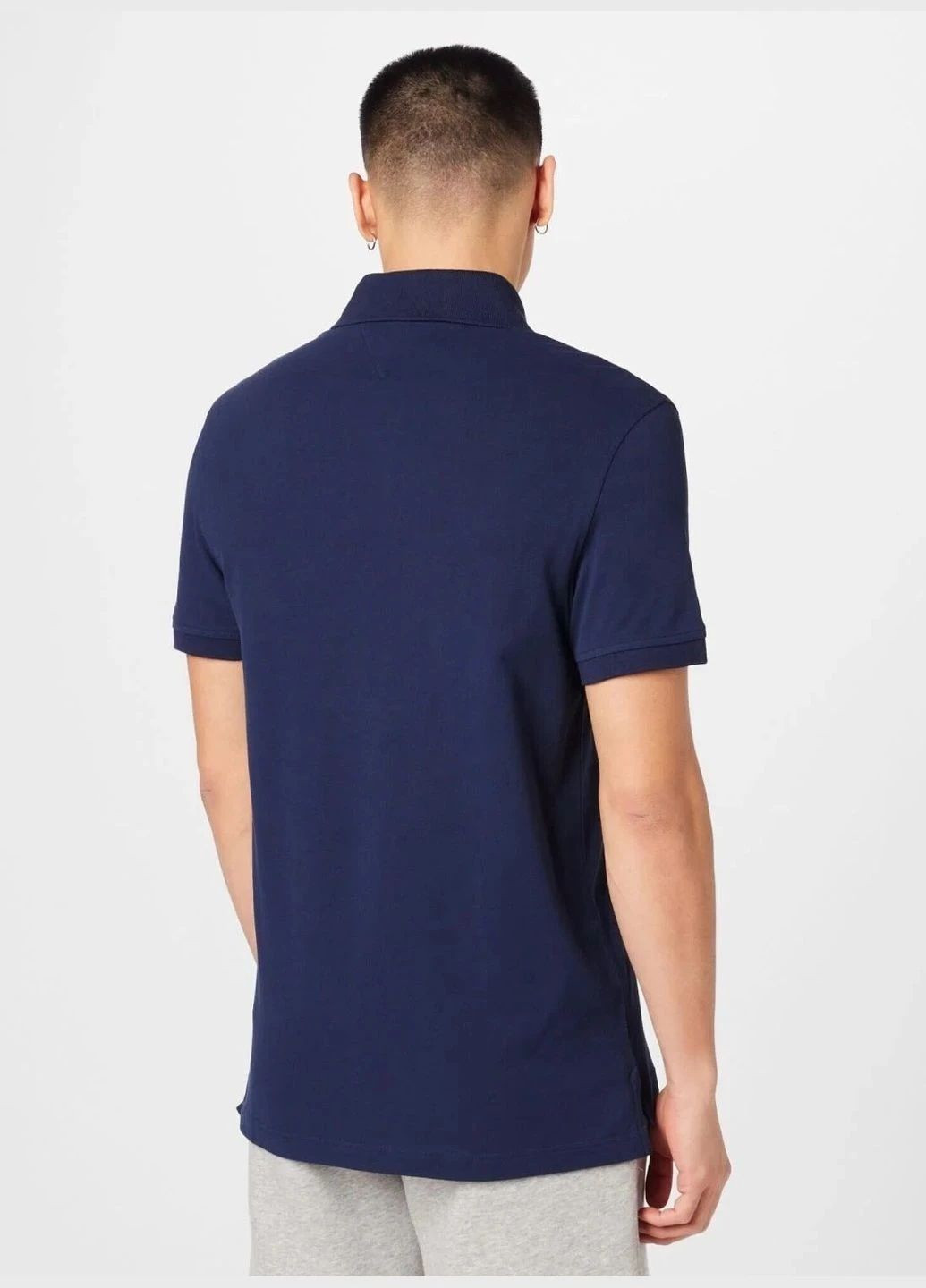 Темно-синяя футболка-поло мужское для мужчин Tommy Hilfiger с логотипом