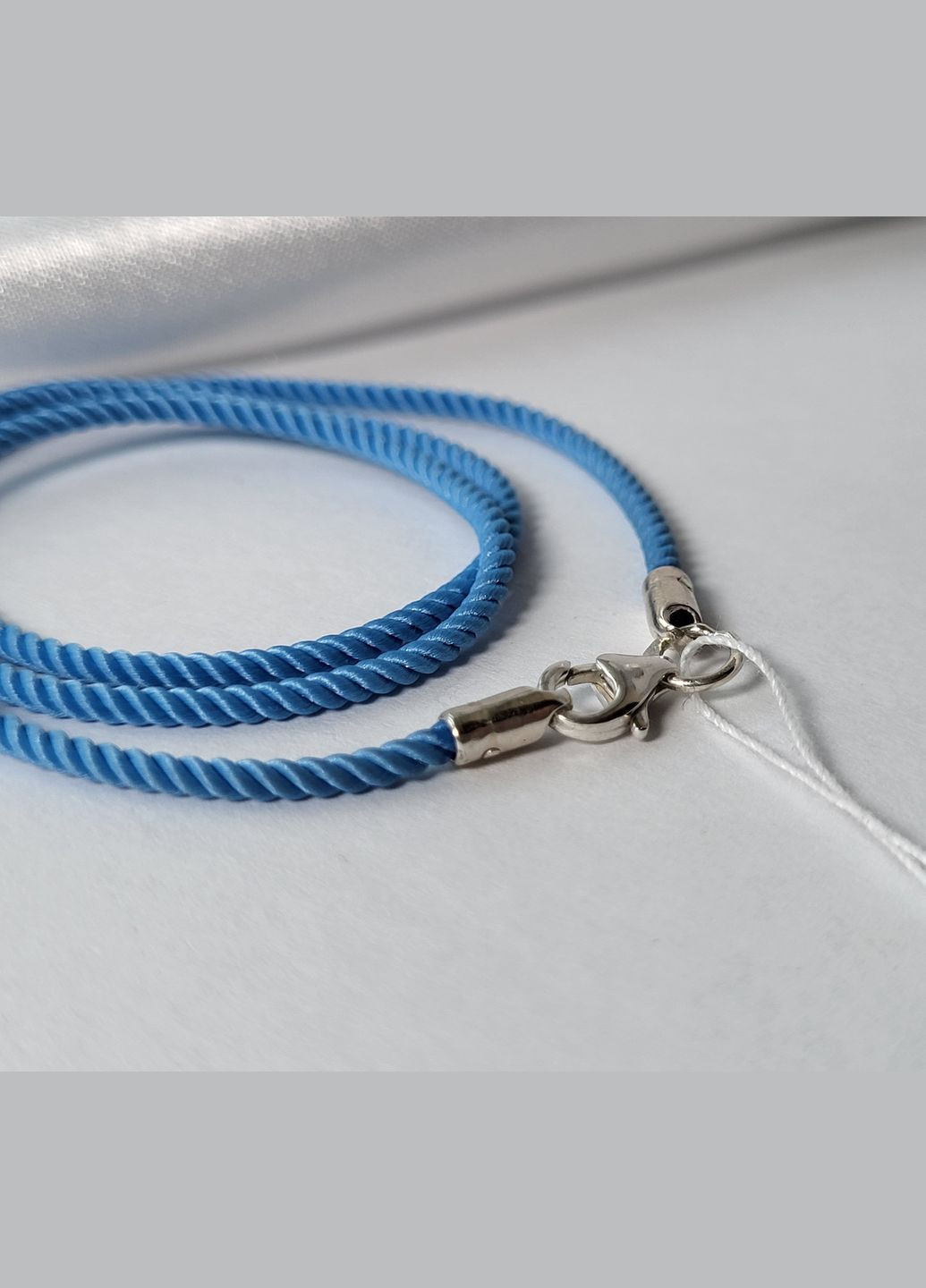 Шнурок на шею милан голубого цвета шелковый 2мм см серебро 925 пробы 6010/2 0.98г No Brand (306854447)