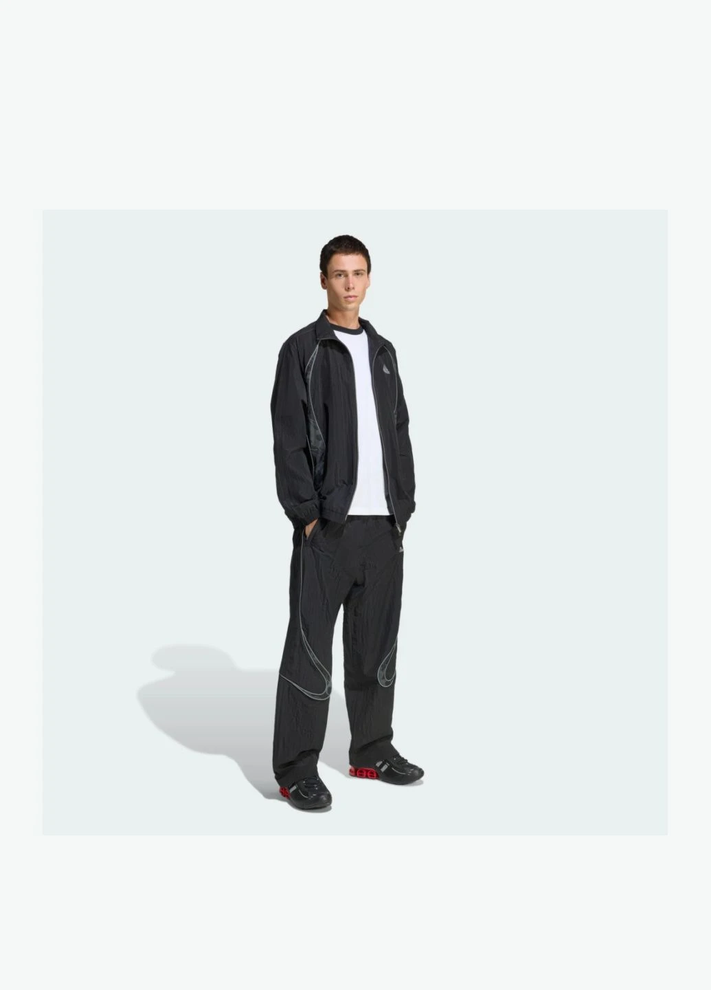 Черные демисезонные брюки adidas