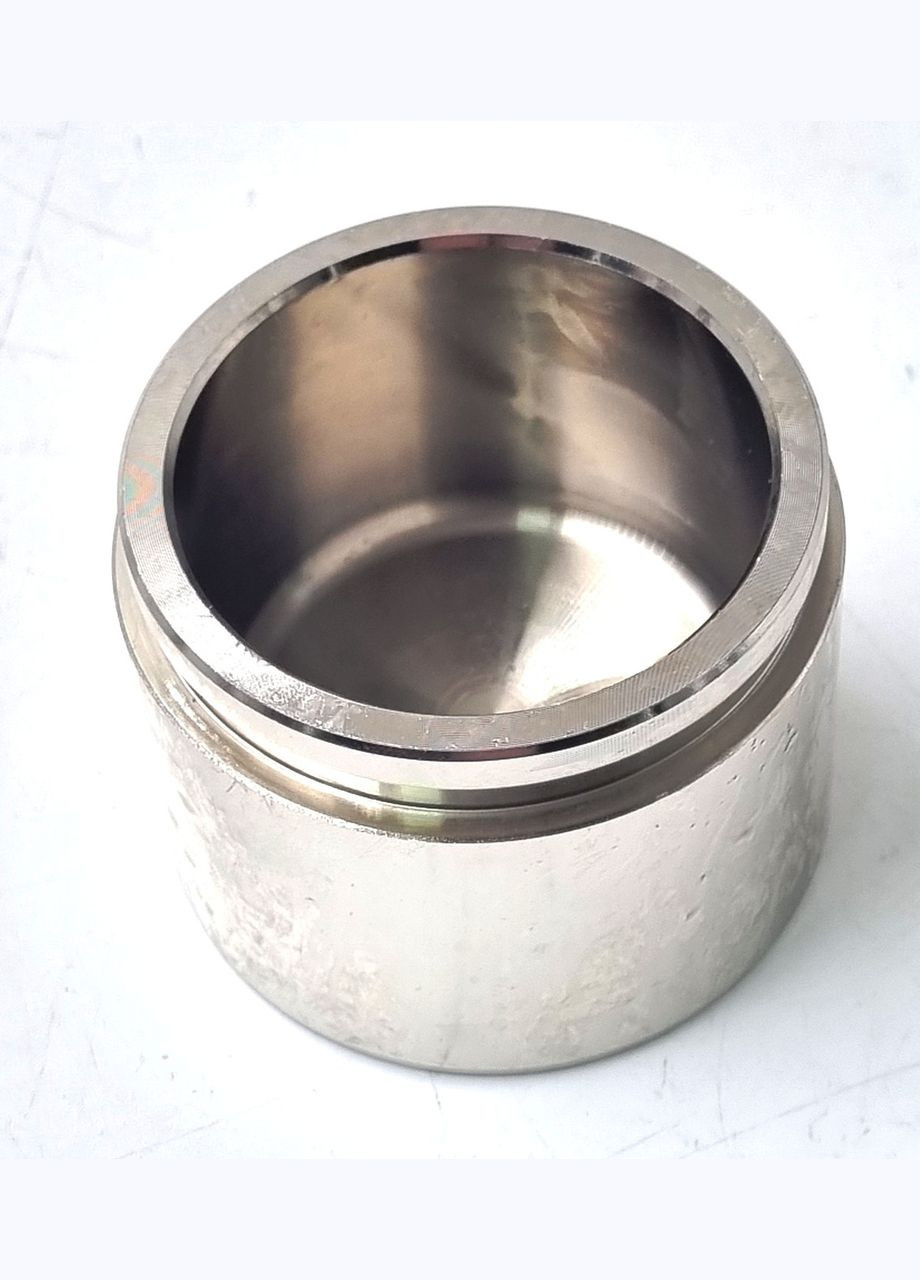 Поршень переднього гальмівного супорта T30W1100 Камрі 47731-33090 RBI (345739304)