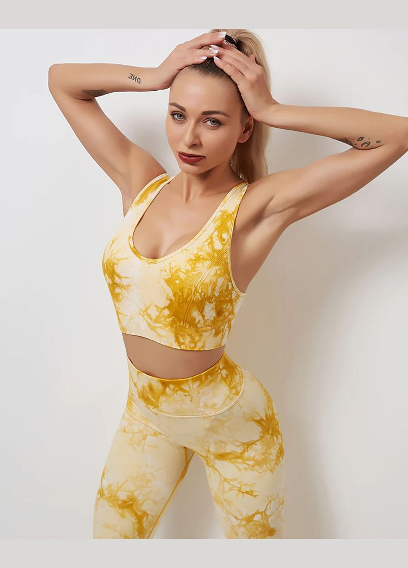 Спортивний костюм з мармуровим принтом (топ та легінси) жовтого кольору, розмір S Trends (330757777)