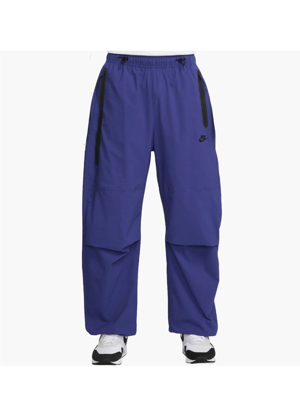 Синие демисезонные брюки Nike