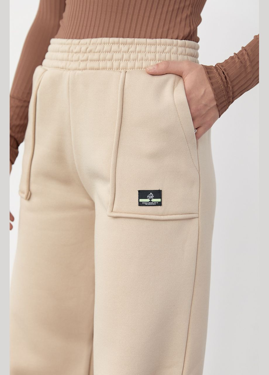 Трикотажні штани на флісі з накладними кишенями 58342 Lurex (280910225)