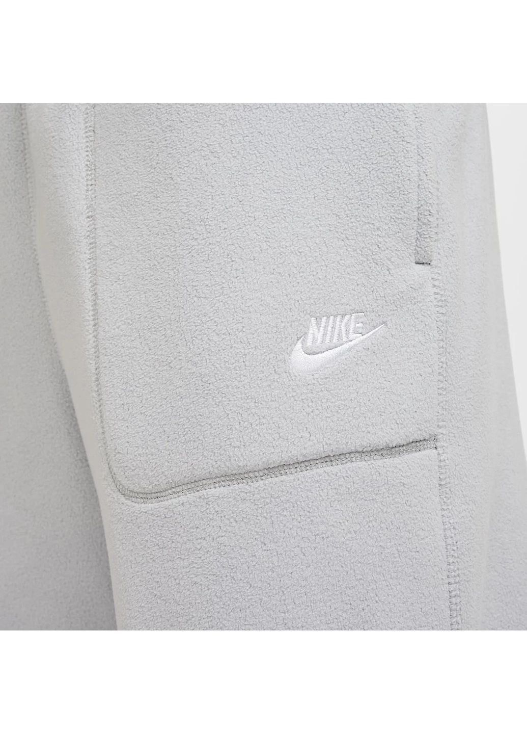 Серые демисезонные брюки Nike