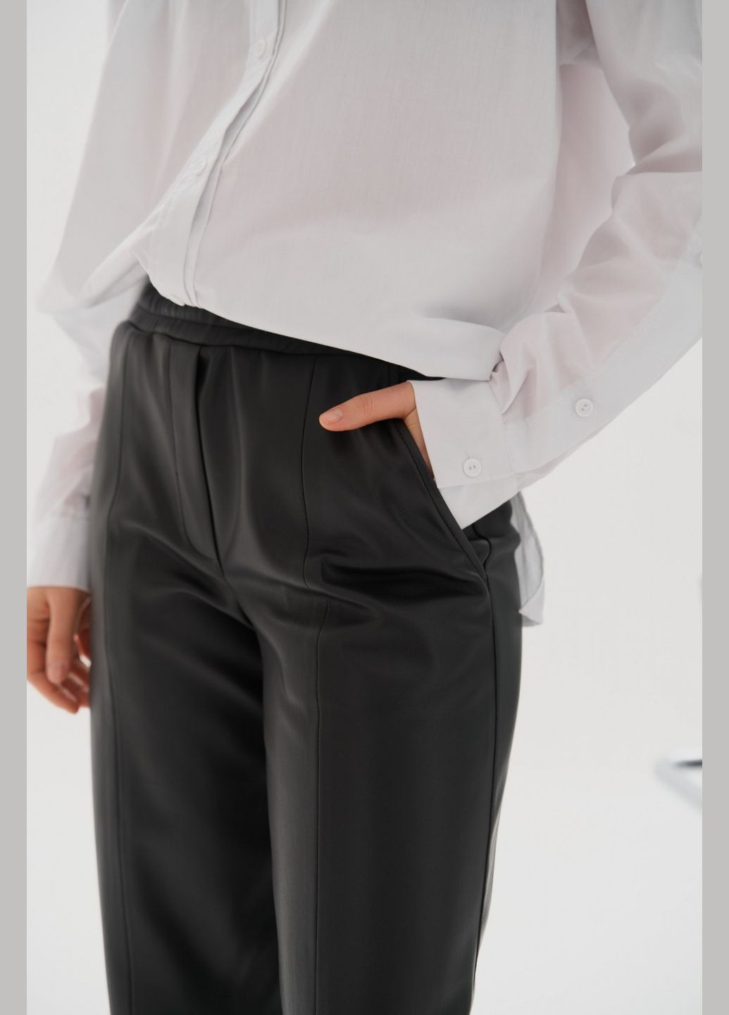 Женские брюки палаццо из эко кожи цвет черный р.L 450866 New Trend (282926685)