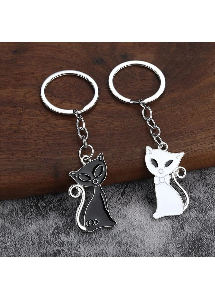 Брелки парні у вигляді чорної і білої кішки для двох закоханих No Brand (339869774)