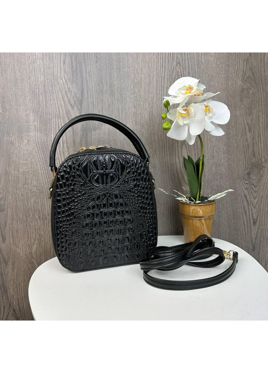 Модная женская сумочка рептилия черная эко кожа на плечо полукруглая лаковая ProDobro (363259332)