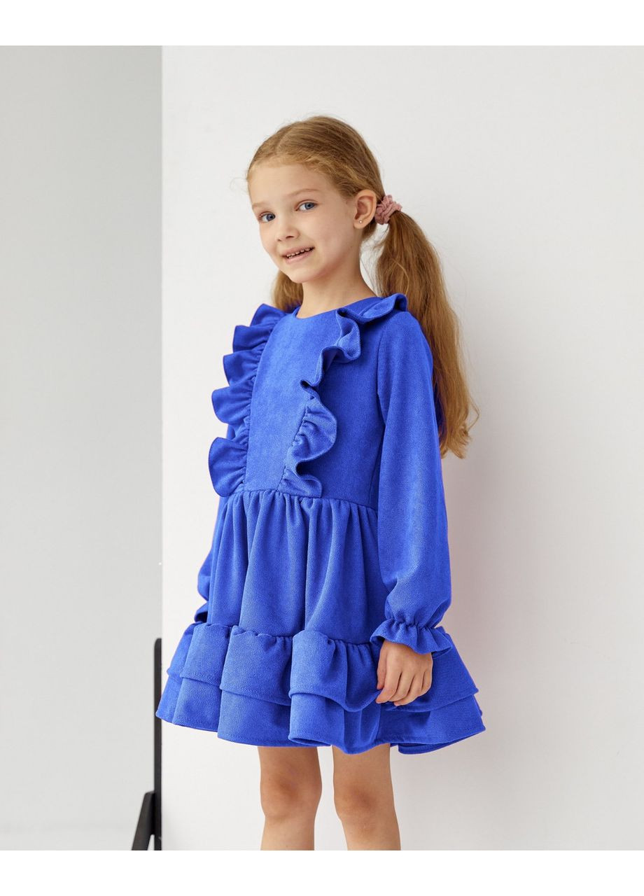 Синіти дитяча сукня з рюшами та довгими рукавами синя Kodi (351902631)