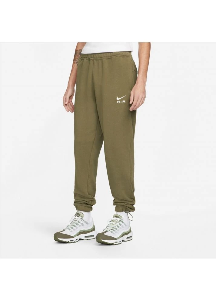 Оливковые демисезонные брюки Nike