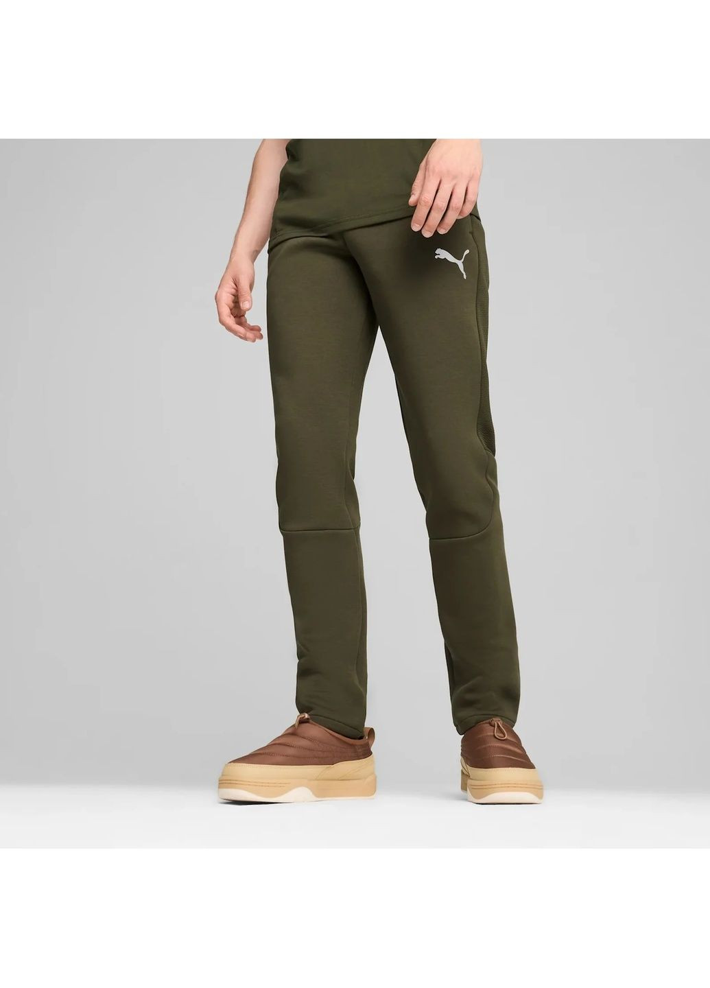 Оливковые демисезонные брюки Puma