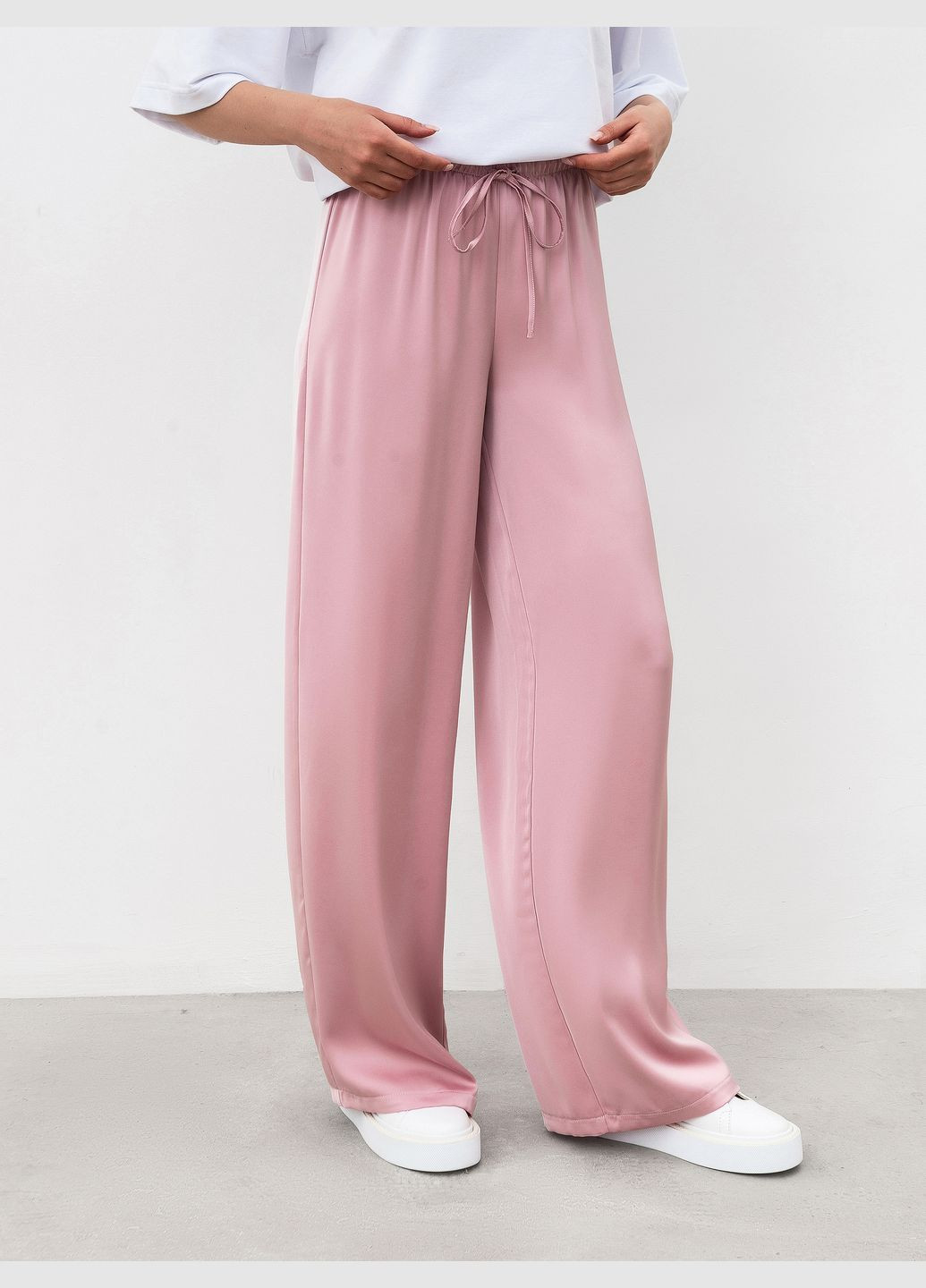 Розовые нарядные демисезонные брюки Ромашка