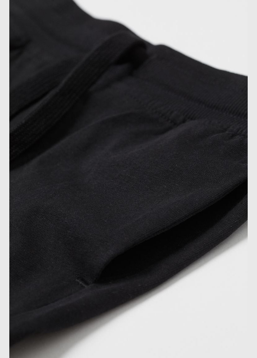 Спортивні штани джоггери бавовняні трикотажні для хлопчика 0738873-019 чорний H&M (282433292)