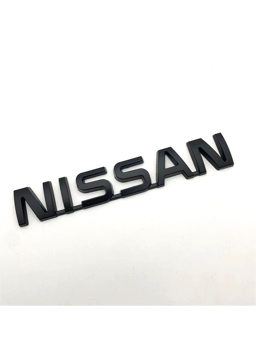 Емблема напис чорна 122х22мм (на скотчі) Nissan (369610232)