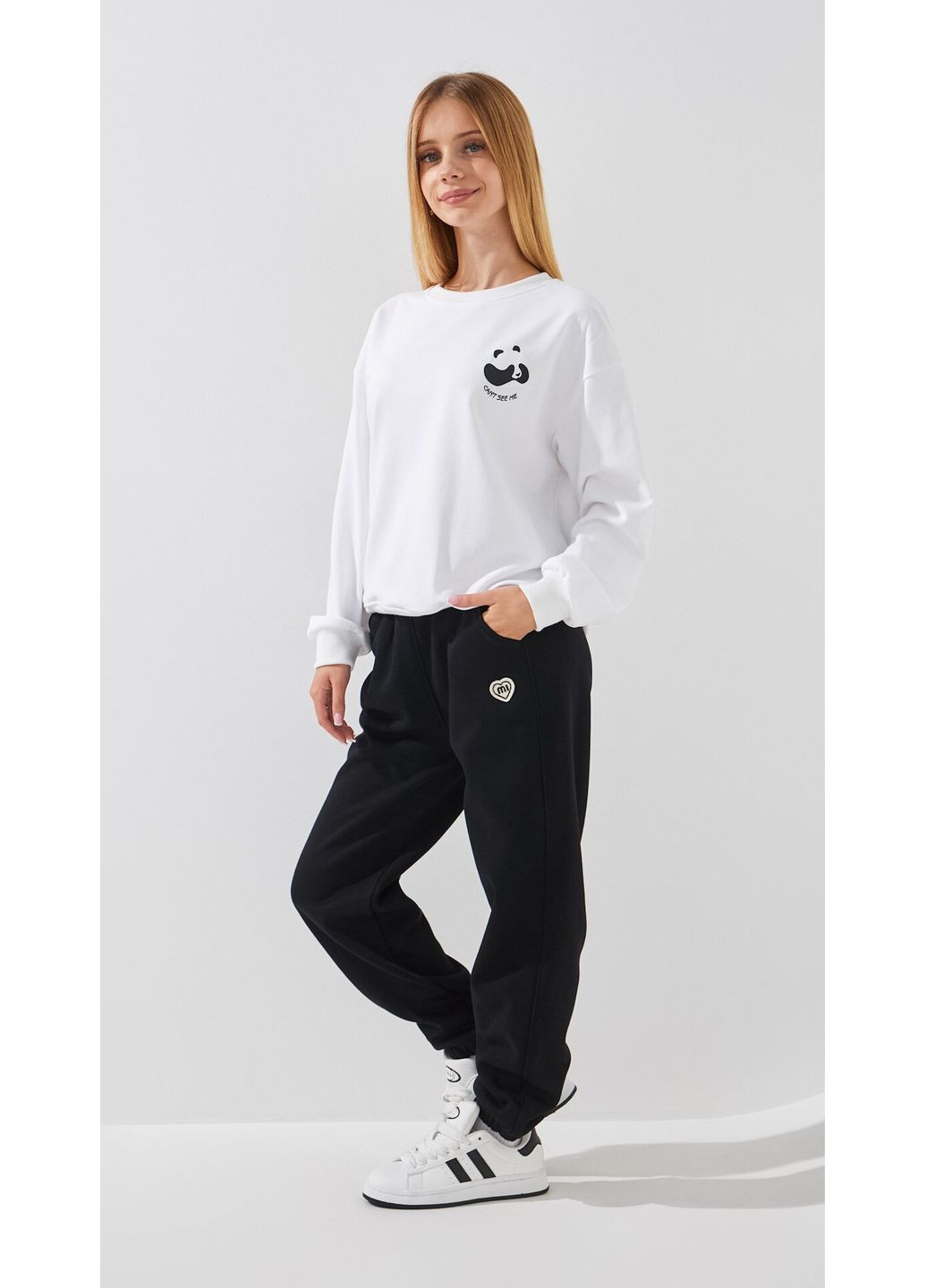 Черные спортивные зимние брюки Dinomin