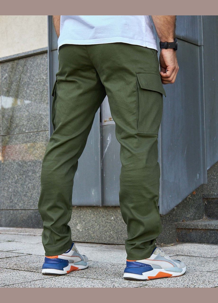 Зеленые демисезонные брюки Olymp