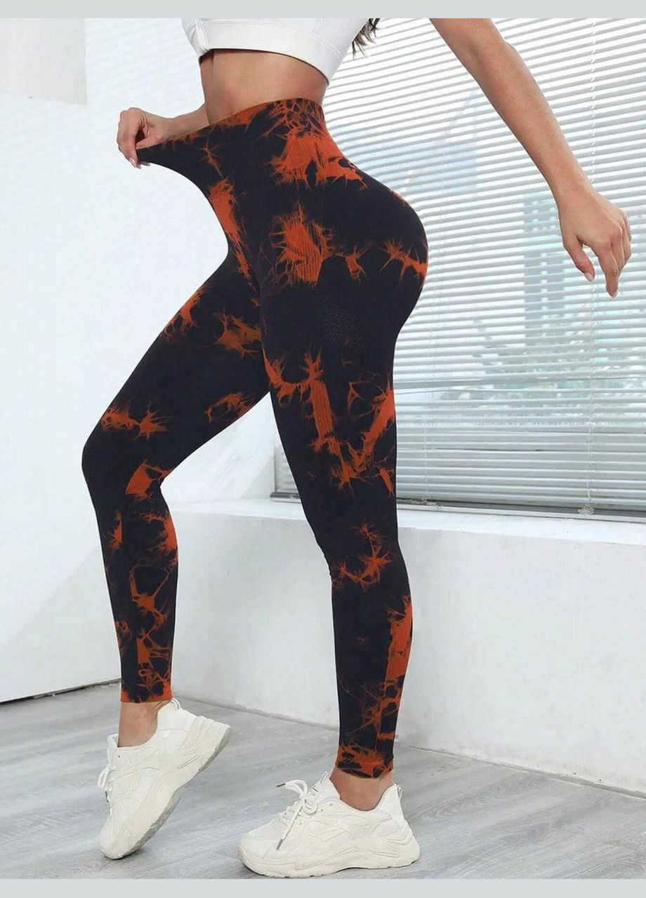 Легінси з мармуровим принтом, чорний з помаранчевим, розмір S Trends (330757845)