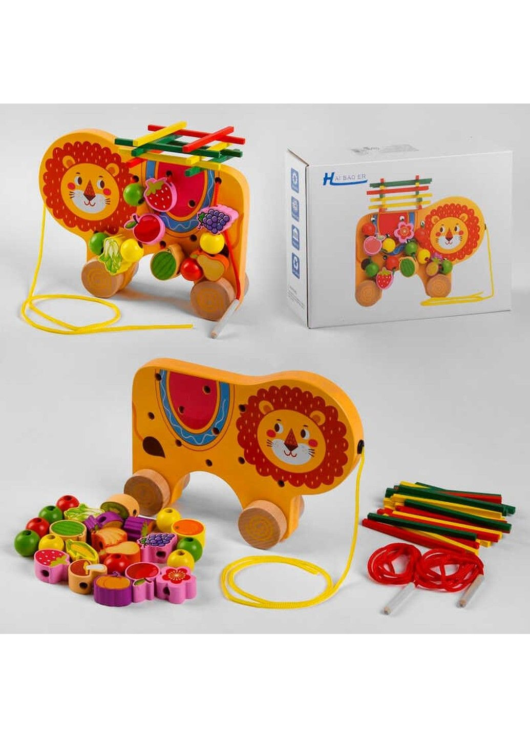 Дерев'яна Каталка С 48173 (36) "Левеня", шнурівка, брусочки, в коробці No Brand (305062600)