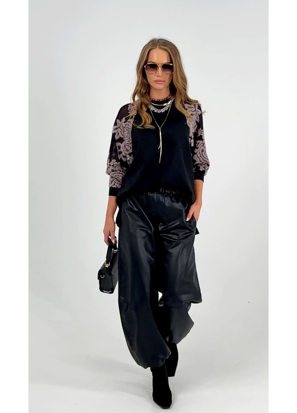 Чорна стильна трикотажна кофта з в'язаним рукавом - ua42 / eu36 Iren Klairie