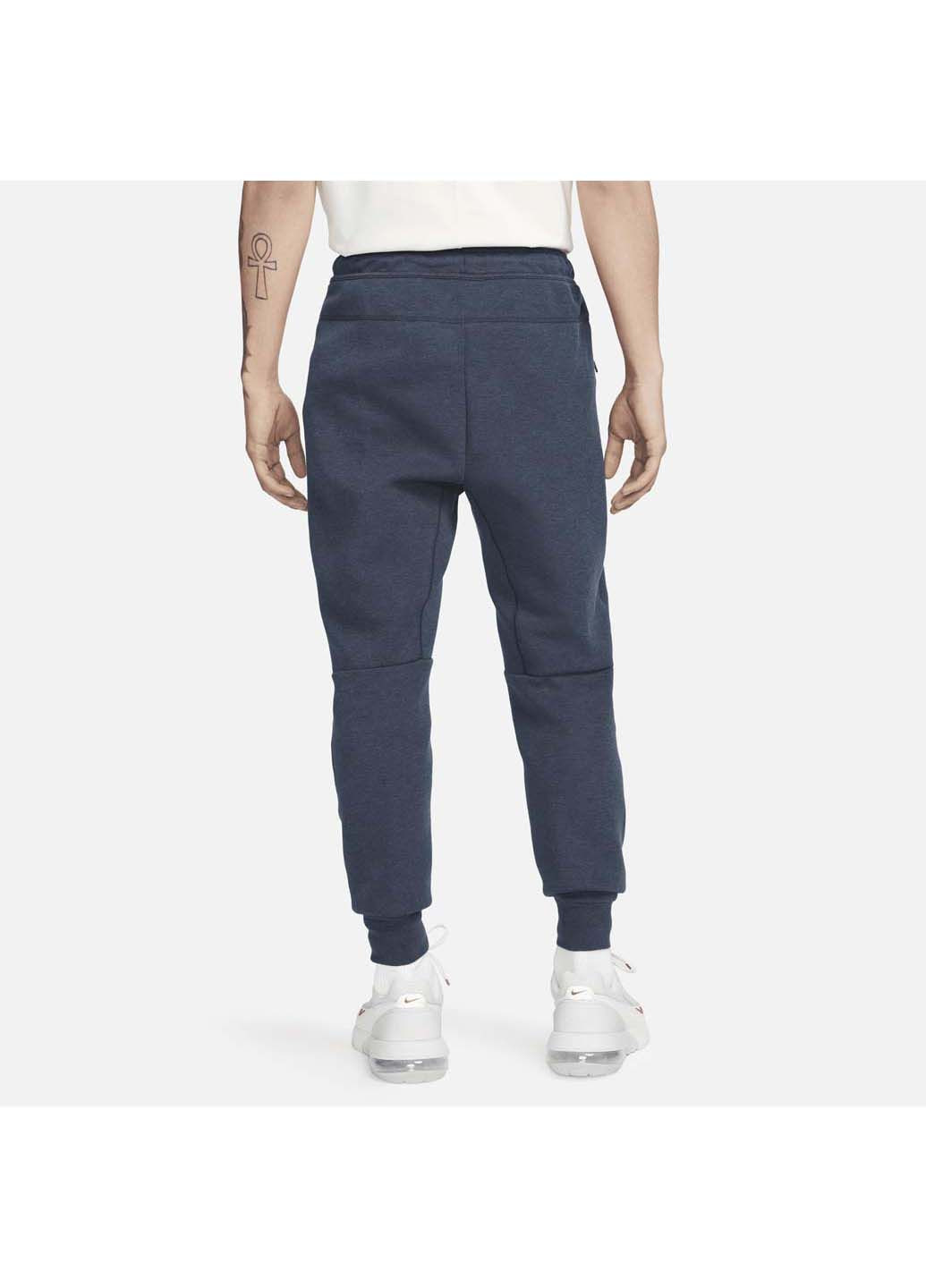 Синие демисезонные брюки Nike