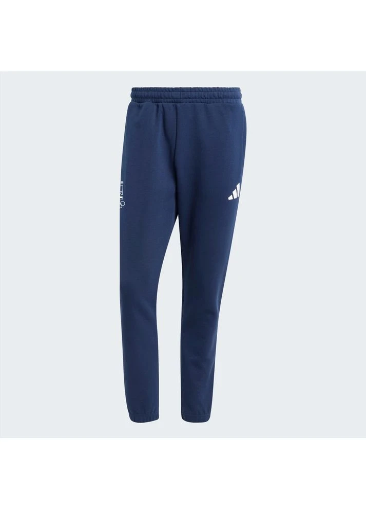 Синие брюки adidas