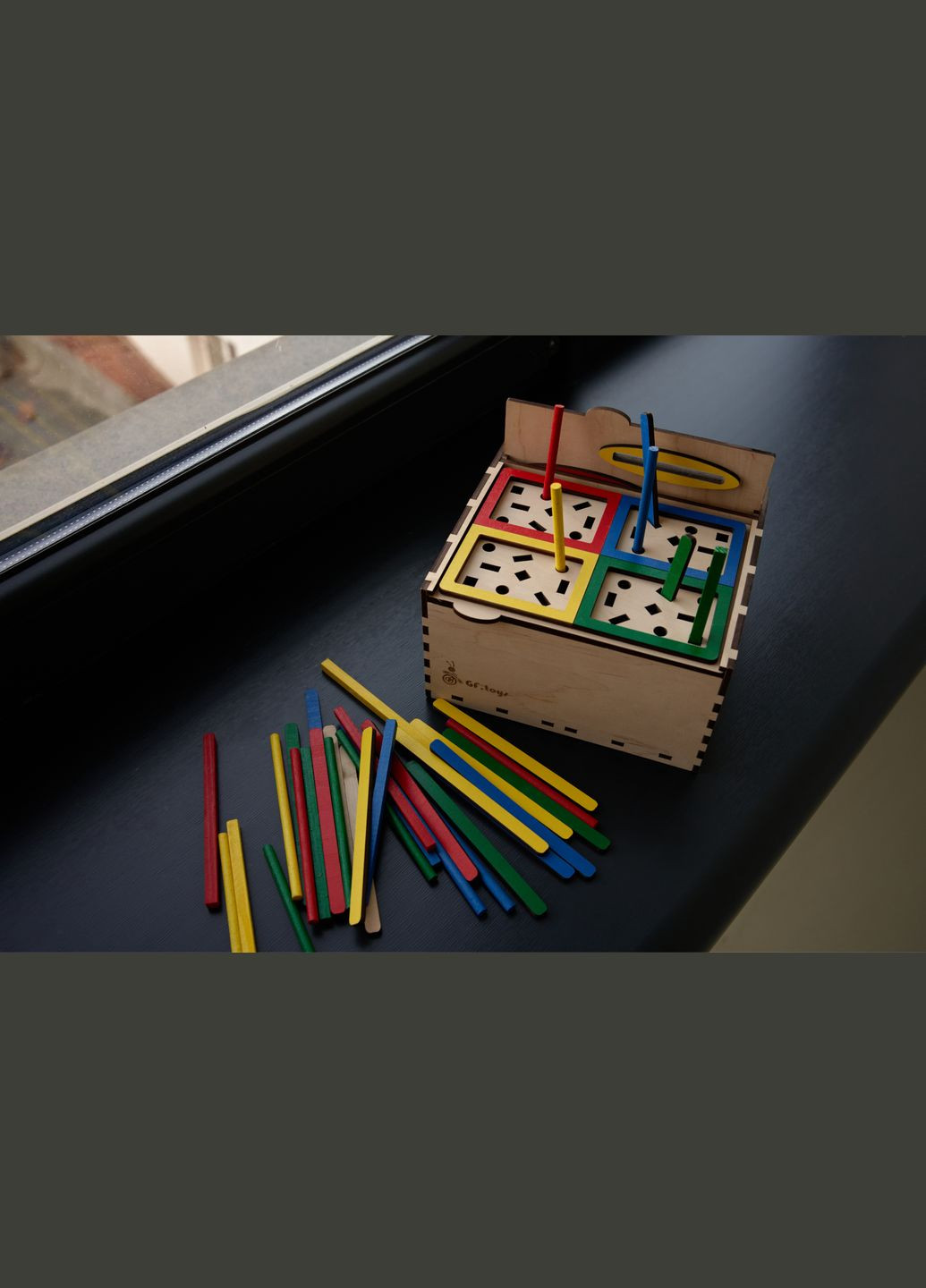 Розвиваюча іграшка Сортер 4в1 (з нішею для кришок) GF toys (339671970)